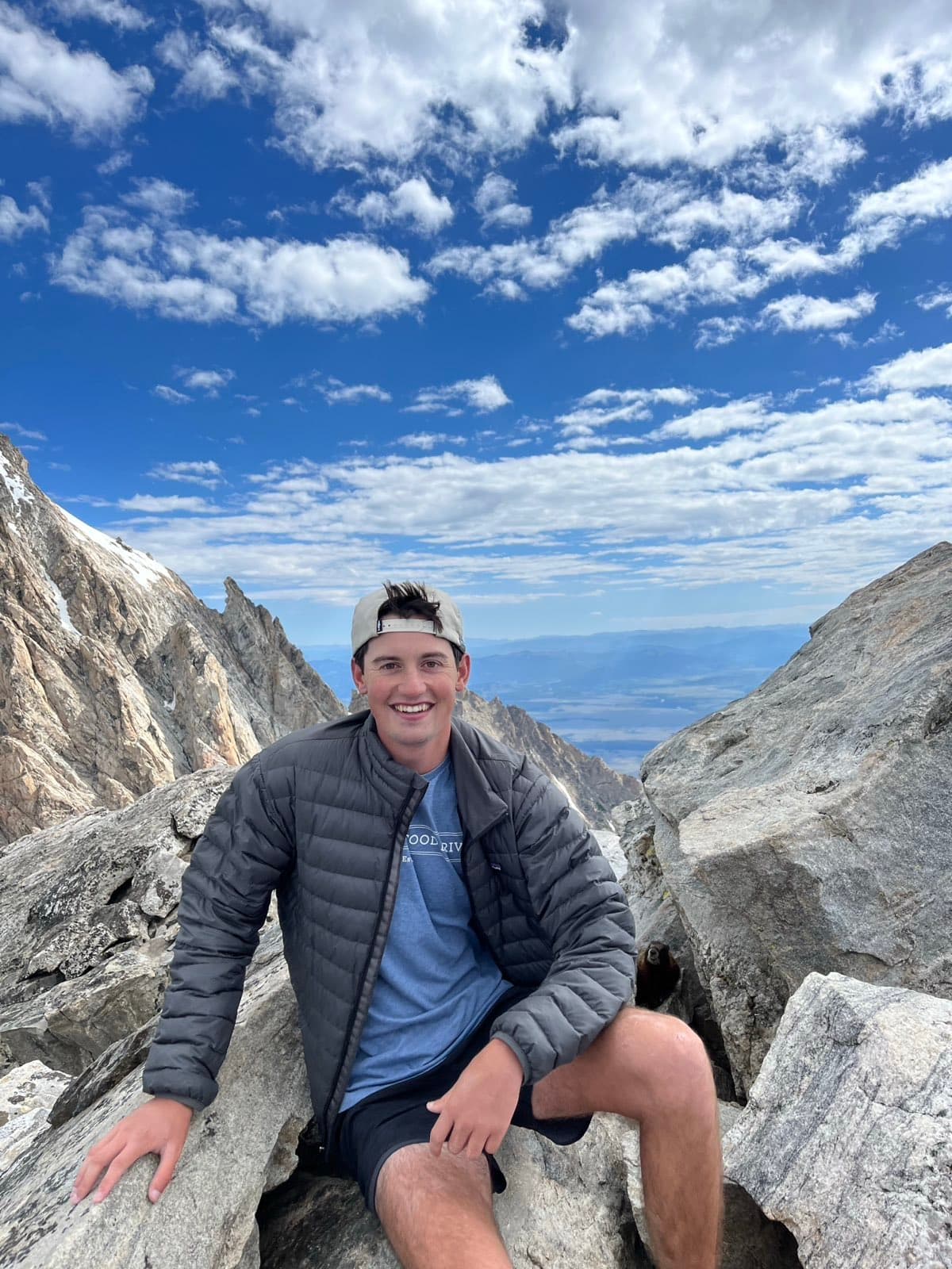 Carter Busby on a summit ridge above treeline.